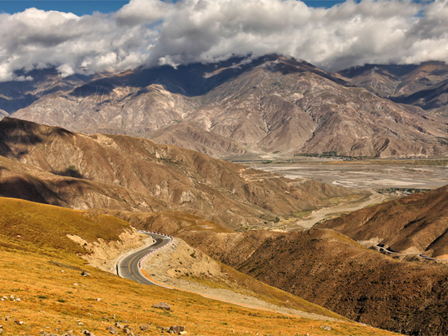 Twisty mountain road in Himalayas Tibet China