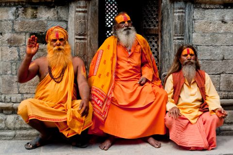 Holy Sadhu men with traditional painted face, blessing in Pashupatinath Temple in Nepal, Kathmandu., Days Yoga Package