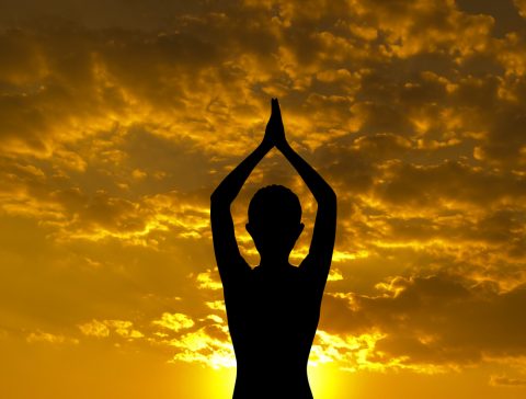 Silhouette of woman doing yoga meditation, Days Yoga Package
