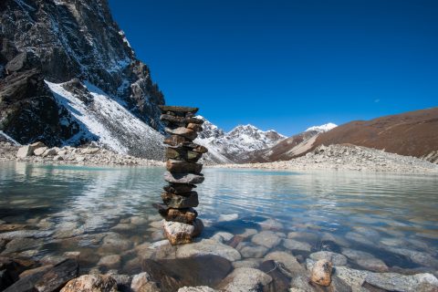 Harmony and balance Stones and Sacred Lake near Gokyo, Three Passes and Everest Base Camp