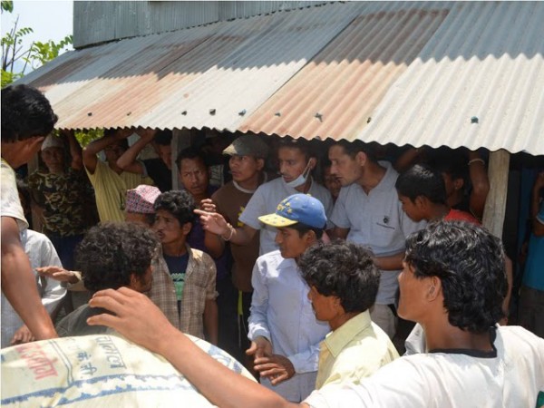 Nishes Thapa Manging the Rice Distribution