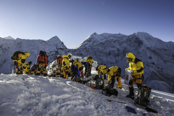 Climbers preparing equipment before an Island Peak climb
